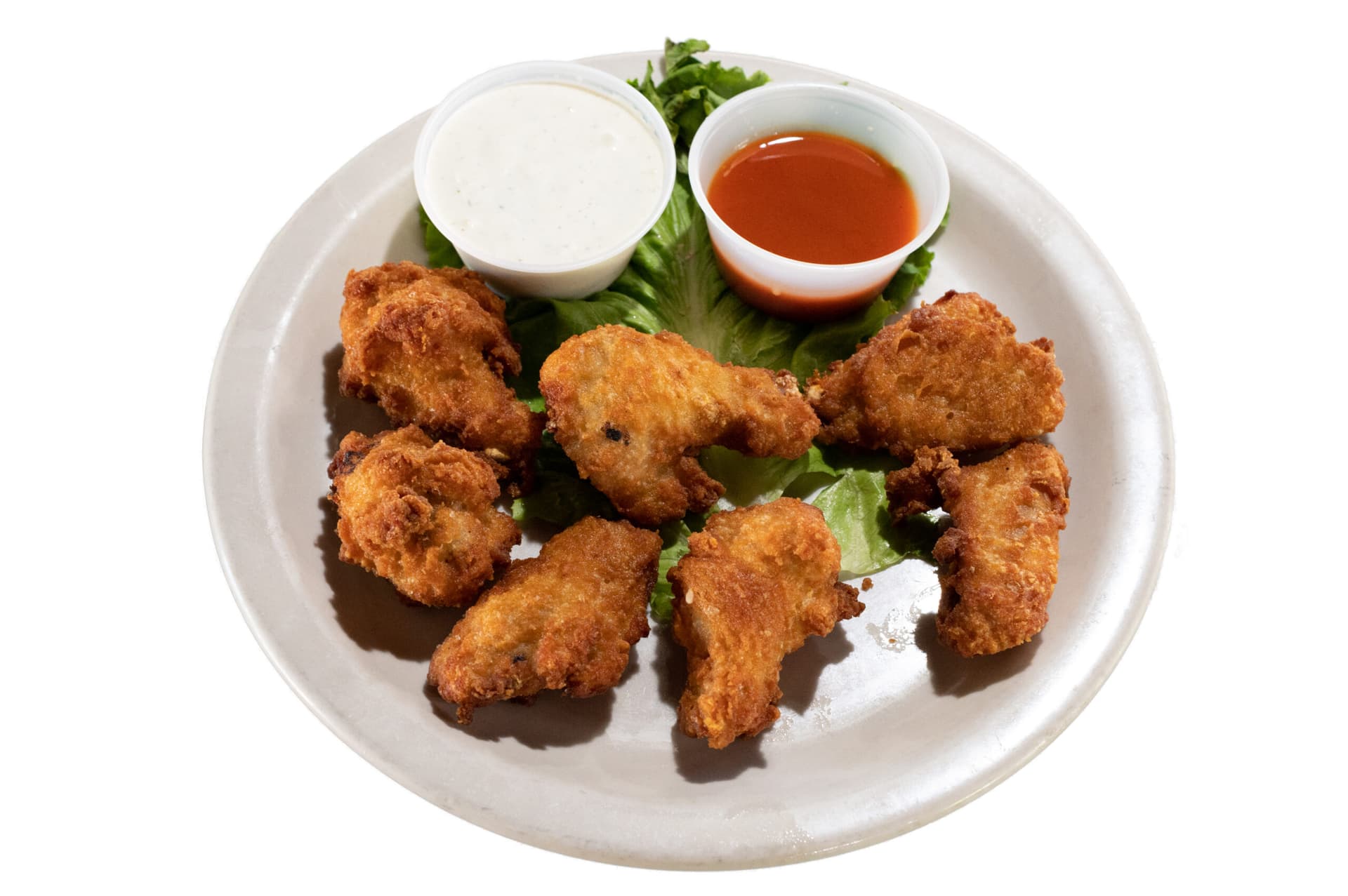 Fried hot wings served with spicy ranch and celery sticks